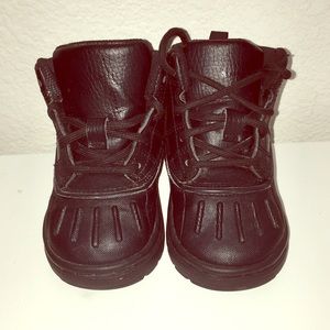 All black acg Nike boots for toddler